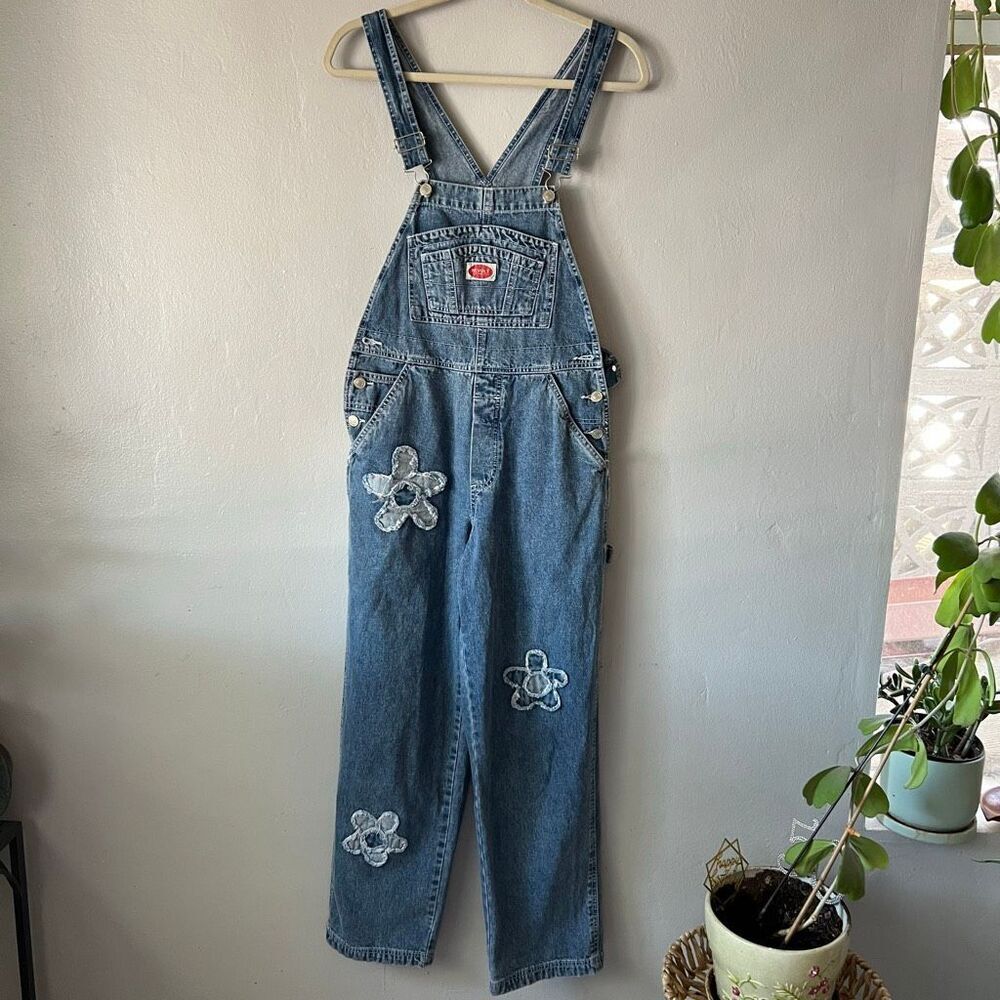 Revolt  1990s or Y2K brand denim overalls featuring distinctive flower patch app